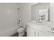 Bright bathroom features a tub with white subway tiles and vanity with hard surface counters at 1937 Quarry Park Nw Pl, Atlanta, GA 30318
