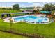 Community pool with covered seating and ample lounge chairs on a sunny day at 1937 Quarry Park Nw Pl, Atlanta, GA 30318