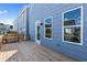 Blue, wood deck with windows and railing at 1937 Quarry Park Nw Pl, Atlanta, GA 30318