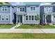 Charming new construction home with blue siding, manicured lawn, and welcoming entrance at 1937 Quarry Park Nw Pl, Atlanta, GA 30318