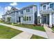 Beautifully landscaped new construction home with modern blue exterior, offering a pristine curb appeal at 1937 Quarry Park Nw Pl, Atlanta, GA 30318