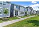 Desirable new construction with blue siding, neat landscaping, and easy sidewalk access at 1937 Quarry Park Nw Pl, Atlanta, GA 30318