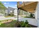 Charming townhomes with white exteriors, driveways, and well-manicured lawns create a welcoming neighborhood street view at 1937 Quarry Park Nw Pl, Atlanta, GA 30318