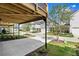 View showcases attached garages, inviting driveways, and green spaces of the townhome community at 1937 Quarry Park Nw Pl, Atlanta, GA 30318