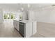 Modern kitchen featuring stainless steel appliances, an island, and ample countertop space at 1937 Quarry Park Nw Pl, Atlanta, GA 30318