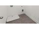 Tiled laundry room with a water tray at 1937 Quarry Park Nw Pl, Atlanta, GA 30318