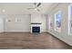 Spacious living room with a modern fireplace, neutral walls, and bright natural light at 1937 Quarry Park Nw Pl, Atlanta, GA 30318