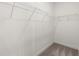 Walk-in closet with carpet and wire shelving at 1937 Quarry Park Nw Pl, Atlanta, GA 30318