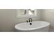Close-up of the bathroom featuring a modern soaking tub with matte black hardware at 1941 Quarry Park Nw Pl, Atlanta, GA 30318