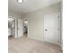 Neutral bedroom with three doors and a light carpet at 1941 Quarry Park Nw Pl, Atlanta, GA 30318