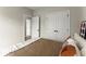 Comfortable bedroom with neutral paint, soft carpet, and ample closet space, perfect for relaxation at 1941 Quarry Park Nw Pl, Atlanta, GA 30318