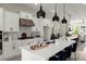Beautiful kitchen featuring white cabinets, stainless steel appliances, and a large island with seating at 1941 Quarry Park Nw Pl, Atlanta, GA 30318