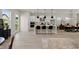 Open concept living space with a modern kitchen, dining area, and plenty of natural light at 1941 Quarry Park Nw Pl, Atlanta, GA 30318