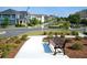Neighborhood street view of well-manicured landscaping, sidewalks and craftsman style houses at 1941 Quarry Park Nw Pl, Atlanta, GA 30318