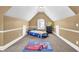 This bedroom features a whimsical car bed and rug, creating a playful and inviting atmosphere at 2040 Browning Bend Ct, Dacula, GA 30019