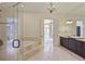 Luxurious bathroom with a soaking tub, glass shower, and dark wood cabinets at 8 Honour Nw Ave # 6, Atlanta, GA 30305