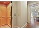 Residential elevator with wood paneling adjacent to dining area and hallway at 8 Honour Nw Ave # 6, Atlanta, GA 30305