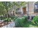 Brick townhome with well-maintained front yard and wrought iron railings at 8 Honour Nw Ave # 6, Atlanta, GA 30305