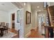 Foyer showcasing hardwood floors, detailed trim work, and a glimpse into other living spaces at 8 Honour Nw Ave # 6, Atlanta, GA 30305