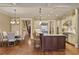 Spacious kitchen with an island, breakfast bar, stainless steel appliances, and adjacent dining area at 8 Honour Nw Ave # 6, Atlanta, GA 30305