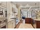 Gourmet kitchen featuring stainless steel appliances, granite countertops, and open layout to the living area at 8 Honour Nw Ave # 6, Atlanta, GA 30305