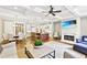 Open-concept living room featuring coffered ceilings, a fireplace, and seamless flow to the kitchen and dining area at 8 Honour Nw Ave # 6, Atlanta, GA 30305