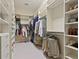 Spacious walk-in closet with ample shelving and hanging space for organized storage at 8 Honour Nw Ave # 6, Atlanta, GA 30305