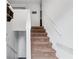 Carpeted stairway leading to the upper floor at 152 Country Cottage Cir, Carrollton, GA 30116