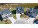 Aerial view of a new construction home in a cul-de-sac with a two car garage and modern design at 1858 Lacebark Elm Way, Lawrenceville, GA 30045