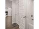 Bathroom featuring a tiled shower and white cabinets, with tile flooring at 1858 Lacebark Elm Way, Lawrenceville, GA 30045