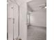 Bathroom featuring a shower with glass doors at 1858 Lacebark Elm Way, Lawrenceville, GA 30045