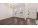 Dining room featuring beautiful hardwood floors and natural light at 1858 Lacebark Elm Way, Lawrenceville, GA 30045