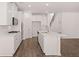 Modern kitchen featuring an island, stainless appliances, and hardwood floors at 1858 Lacebark Elm Way, Lawrenceville, GA 30045