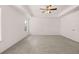 Spacious main bedroom features large windows and neutral carpeting at 1858 Lacebark Elm Way, Lawrenceville, GA 30045