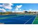 Well-maintained tennis courts offer residents a great recreational amenity for outdoor play at 1858 Lacebark Elm Way, Lawrenceville, GA 30045