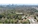 Stunning aerial view of property at 348 Lakemoore with mature trees and a beautiful surrounding neighborhood at 348 Lakemoore Ne Dr, Atlanta, GA 30342