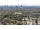 Gorgeous aerial view of 348 Lakemoore surrounded by lush trees and established neighborhood at 348 Lakemoore Ne Dr, Atlanta, GA 30342