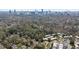 Lovely aerial view of property surrounded by lush trees in a well-developed neighborhood at 348 Lakemoore Ne Dr, Atlanta, GA 30342
