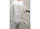 Modern bathroom showcasing a floating sink with chrome fixtures and a clean, minimalist design at 348 Lakemoore Ne Dr, Atlanta, GA 30342