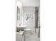 Updated bathroom with a tub, shower, and vanity with a window allowing natural light at 348 Lakemoore Ne Dr, Atlanta, GA 30342