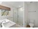 Bathroom featuring double sink vanity, tile flooring and a glass enclosed shower at 348 Lakemoore Ne Dr, Atlanta, GA 30342