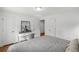 Bright bedroom with an adjacent workspace and neutral color scheme at 348 Lakemoore Ne Dr, Atlanta, GA 30342