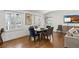 Elegant dining room with a modern table, chairs, and ample natural light at 348 Lakemoore Ne Dr, Atlanta, GA 30342