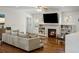 Comfortable living area with a fireplace and built-in bookshelves at 348 Lakemoore Ne Dr, Atlanta, GA 30342