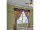 Bright bedroom featuring a window and closet space at 2452 Lakebrooke Dr, Marietta, GA 30066