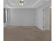 Spacious primary bedroom featuring a tray ceiling and neutral decor at 2452 Lakebrooke Dr, Marietta, GA 30066