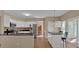 Bright and airy kitchen with a center island and sliding glass doors to the outside at 2452 Lakebrooke Dr, Marietta, GA 30066
