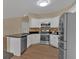 Beautiful kitchen featuring granite countertops, stainless steel appliances, and modern cabinets at 2452 Lakebrooke Dr, Marietta, GA 30066
