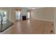 Spacious living room featuring a fireplace and light wood floors, ideal for modern living at 2452 Lakebrooke Dr, Marietta, GA 30066