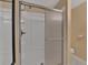 Bathroom features a shower with sliding glass doors and chrome fixtures at 2452 Lakebrooke Dr, Marietta, GA 30066
